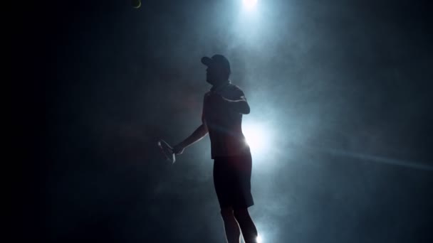 Super Slow Motion Tennis Player Silhouette Hitting Ball Smoke Effect — Stock Video