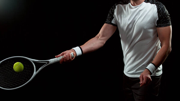 Close Tennis Player Hitting Ball Isolated Black Background Stock Photo