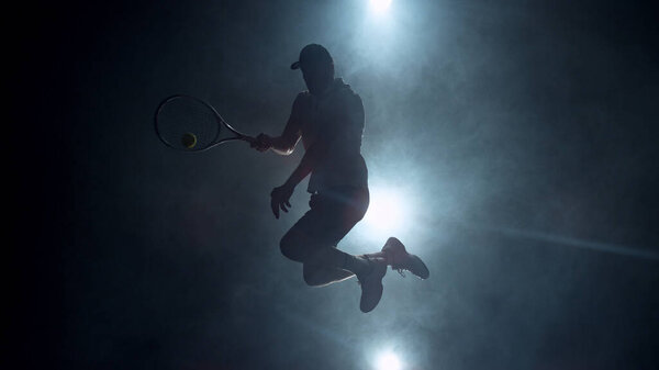 Dramatic Tennis Player Silhouette Jumping Air Silhouette Smoke Background Dark Stock Photo