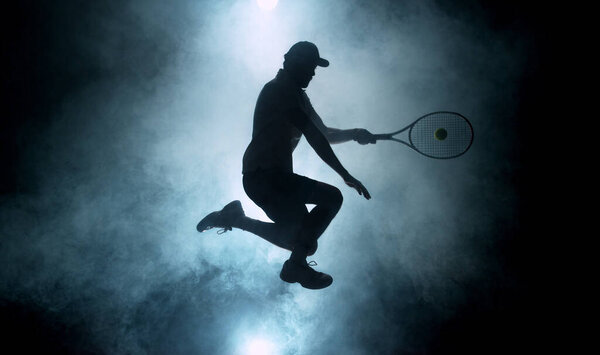 Dramatic Tennis Player Silhouette Jumping Air Silhouette Smoke Background Dark Royalty Free Stock Photos