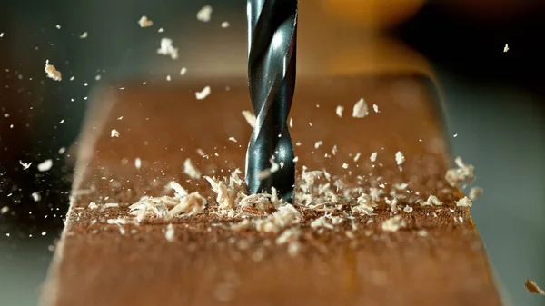Drilling Wooden Plank Close Macro Shot Metal Drill Flying Sawdust — Fotografia de Stock