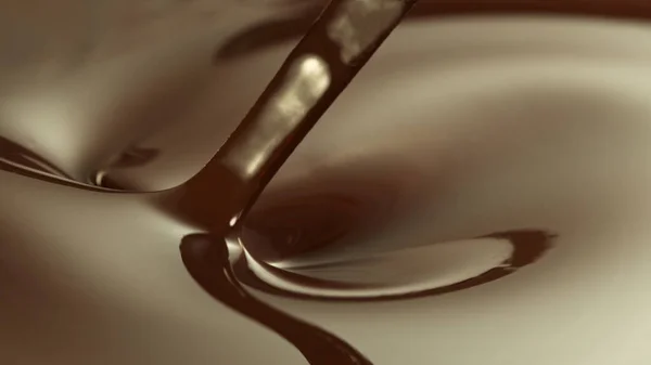 Close Stirring Stream Melted Chocolate Creating Smooth Shapes — Photo