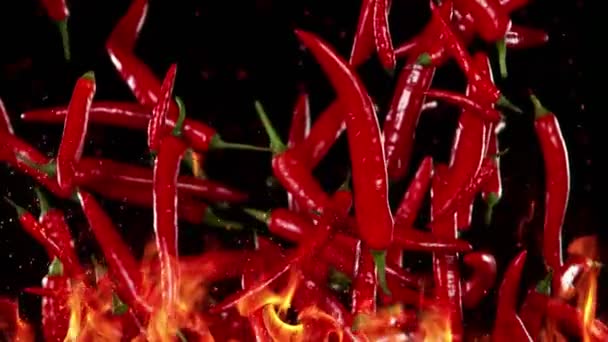 Super Slow Motion Flying Red Hot Chilli Peppers Fire Filmed — Stock video