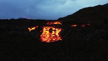 Aerial panoramic footage of Meradalir lava river field. Iceland 20.8.2022. Drone footage, lava is spreading out of crater.