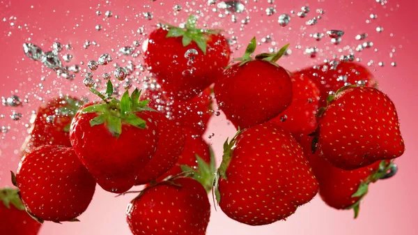 Strawberry Fruit Falling Splashing Underwater Isolated Red Background — Stock Photo, Image