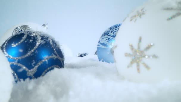 Super Slow Motion Falling Snow Christmas Glass Balls Camera Movement — Stock Video