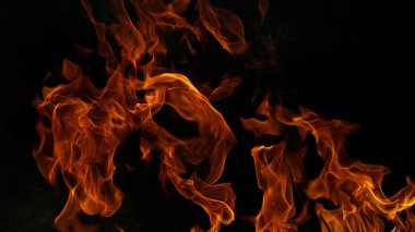 Siyah arkaplanda soyut yangın alevi arkaplanı.