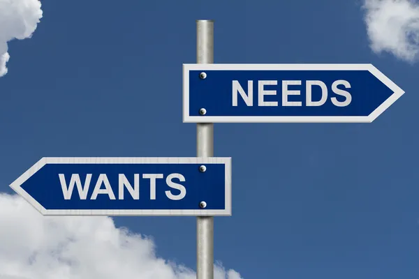 Wants versus Needs — Stock Photo, Image