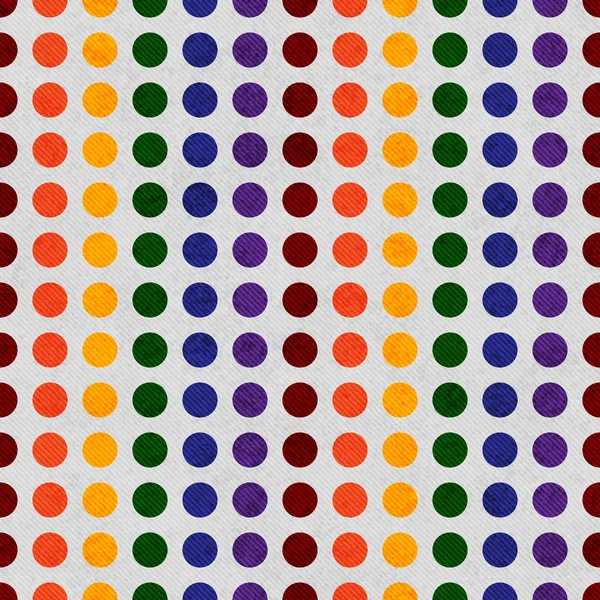 Regenboog gekleurde polka dot geweven stof achtergrond — Stockfoto