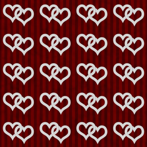 Weiße ineinander verwobene Herzen und rote Streifen texturierten Stoff Backgrou — Stockfoto