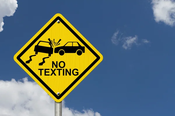 Нет текстов во время вождения знак — стоковое фото