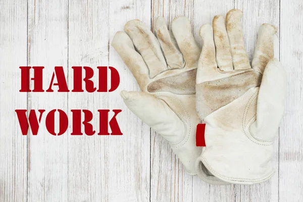 Hard Work Message Dirt Covered Leather Work Gloves Weathered Wood — Stock Photo, Image