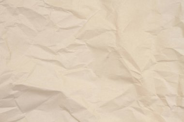 Kahverengi ambalaj kağıdı arka planında ambalaj mesajınız için kopyalama alanı olan tahıl dokusu ya da doku olarak kullanılacak