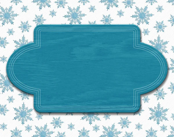 蓝色雪花上的空白蓝色木签 并附有冬季或雪中信息的复制空间 — 图库照片
