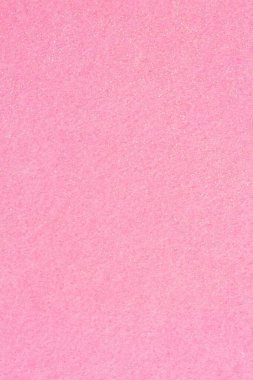 Mesajınız için parlak arkaplanı boş soluk pembe keçeli kumaş veya doku olarak kullanın