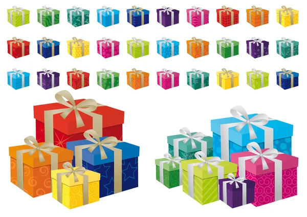 Different coloured festive gifts with silver and gold bows. — Stock Photo, Image