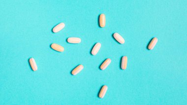 Medicine debate concept. Biotechnology banner with pills. Copy space for text. flatlay.