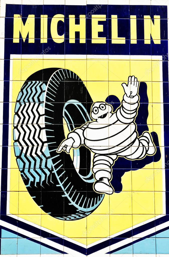 Barcelona, Spain - 08 July, 2012: Vintage Michelin advertisement in the old town of Barcelona. Michelin is a famous tyre manufacturer based in France.