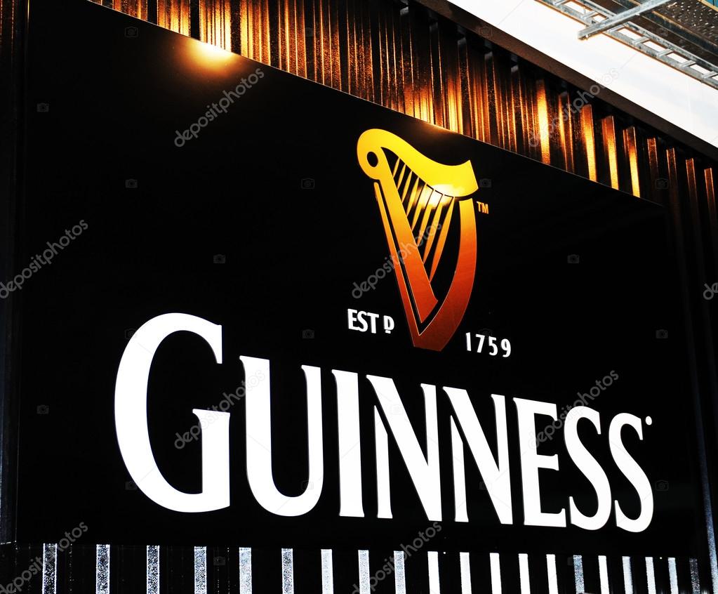 Dublin, Ireland - 30 March, 2013: Guinness logo at the entrance to Guinness Storehouse (Hop Store), a major tourist attraction located at St. Jamess Gate Brewery.