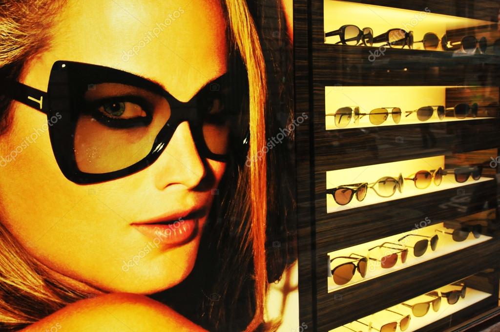 Dolce & Gabanna sunglasses shop at night in Paris