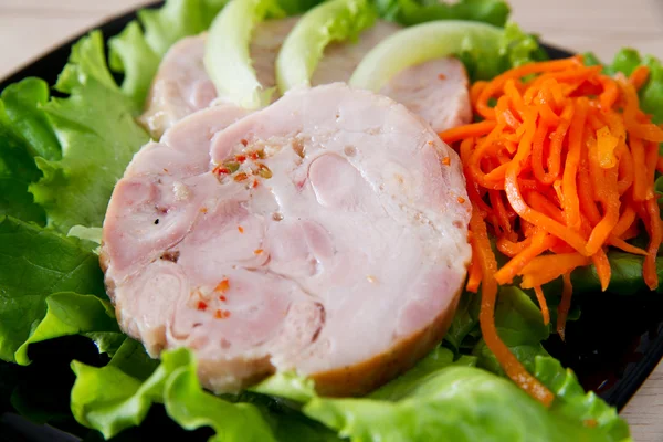 Chicken roulade on salad. — Stock Photo, Image