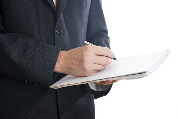 Businessman with pen and notepad Stock Picture