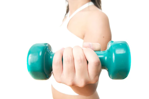 Girl with green dumbbells in hand — Stock Photo, Image