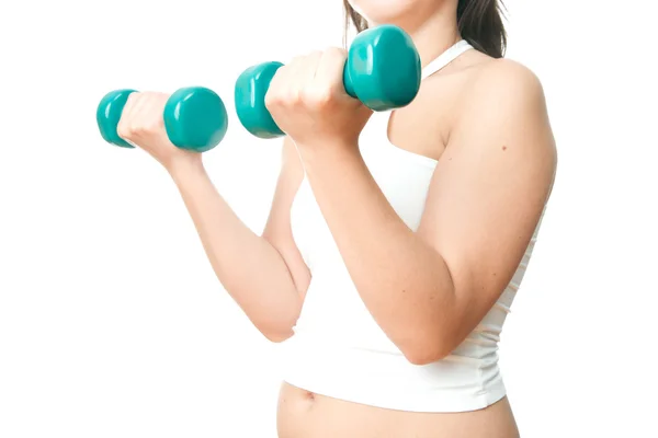 Girl with green dumbbells in hand — Stock Photo, Image