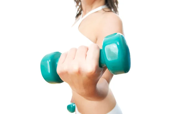 Girl with green dumbbells in hand — Stock Photo, Image