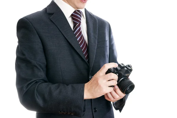 Zakenman met camera — Stockfoto