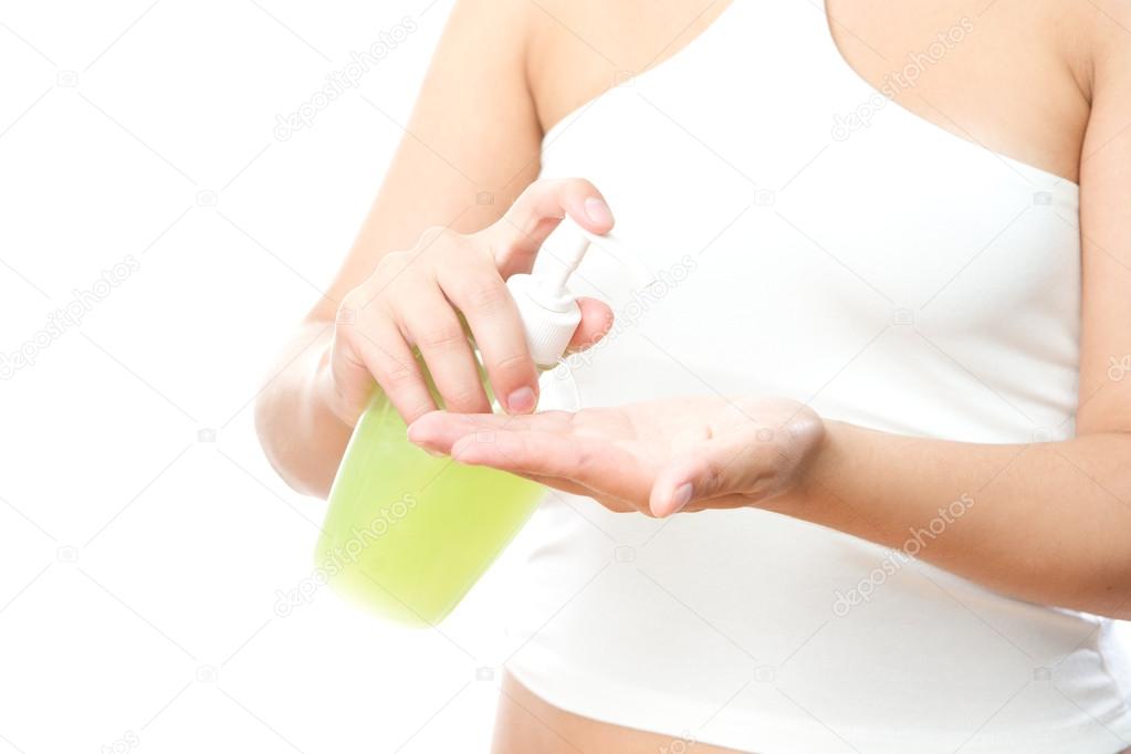 Liquid soap in female hands