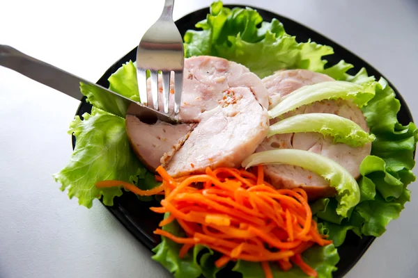 Chicken roulade on salad. — Stock Photo, Image