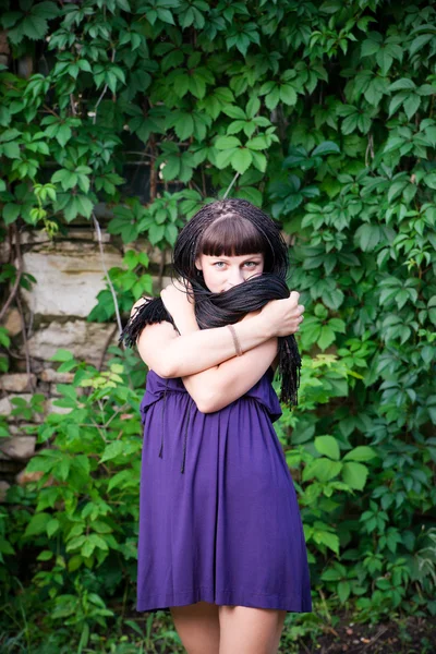 Beautiful young girl in park — Stock Photo, Image