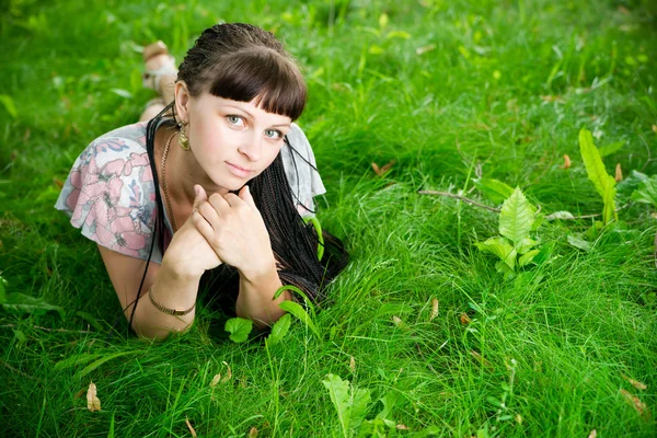 Beautiful young girl in meadow — Stock Photo, Image