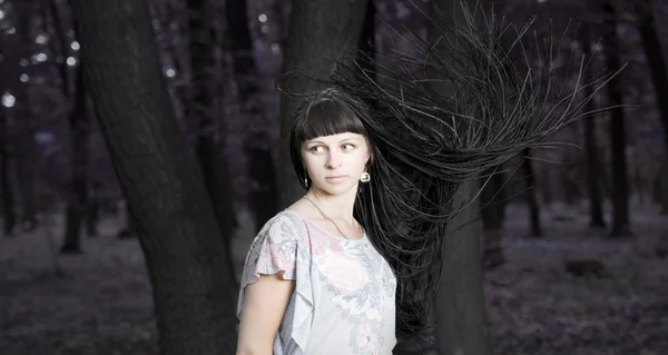 Beautiful young girl in park — Stock Photo, Image