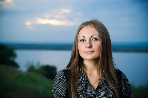 Beautiful young girl on river. Stock Picture