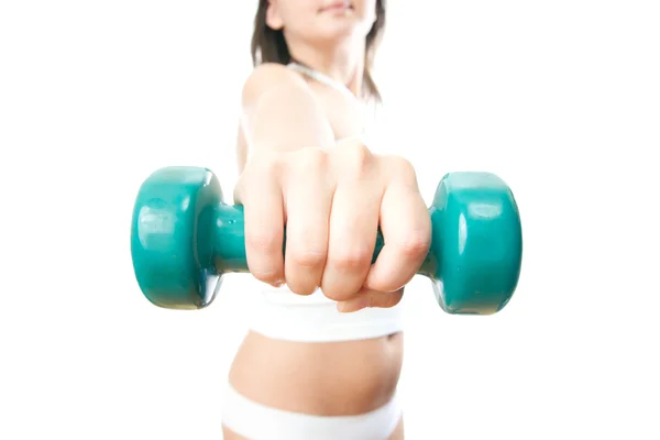 Girl with green dumbbells in hand — Stock Photo, Image
