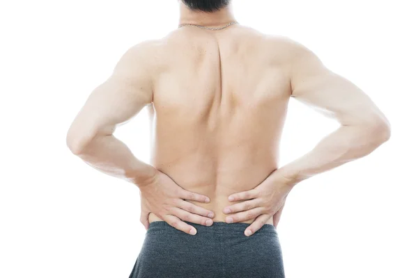 Pain in the lower back in men Stock Picture