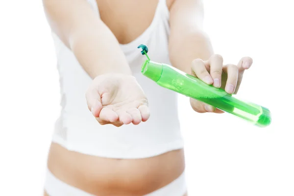 Shampoo in female hands — Stock Photo, Image