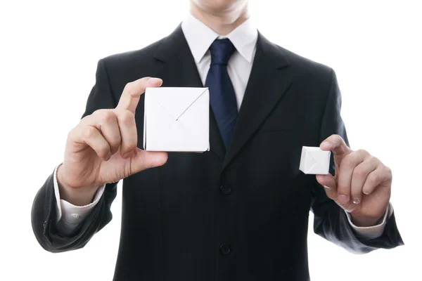 Homme d'affaires avec un cube dans les mains — Photo