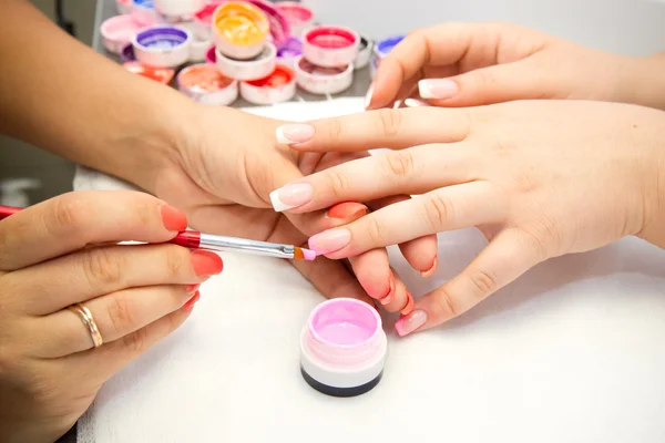 Artificial nails in a beauty salon — Stock Photo, Image