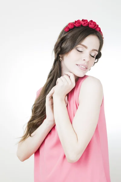 Young beautiful woman with flower wreath on head — Stock Photo, Image