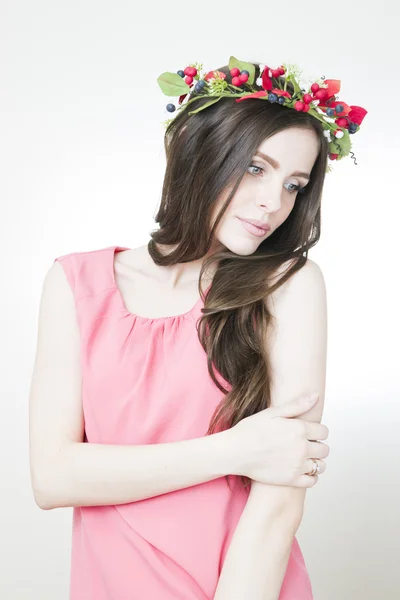 Young beautiful woman with flower wreath on head — Stock Photo, Image