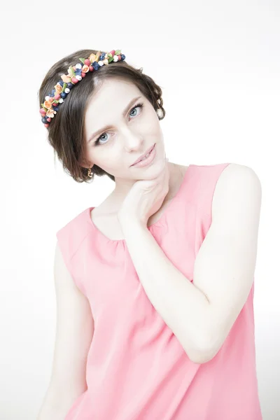 Young beautiful woman with flower wreath on head — Stock Photo, Image