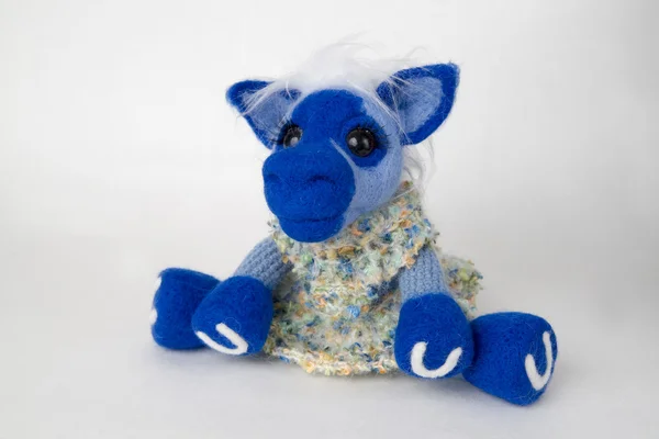 Toy blue horse in a gift — Stock Photo, Image