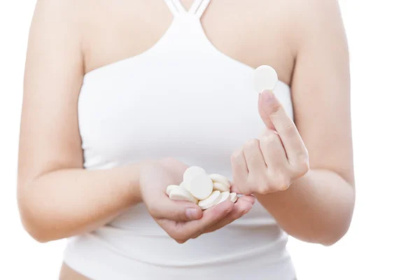 Tabletter i kvinnor händer — Stockfoto