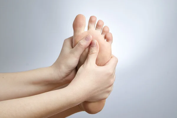 女性の足の痛み ストックフォト
