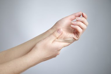 Pain in the joints of the hands clipart