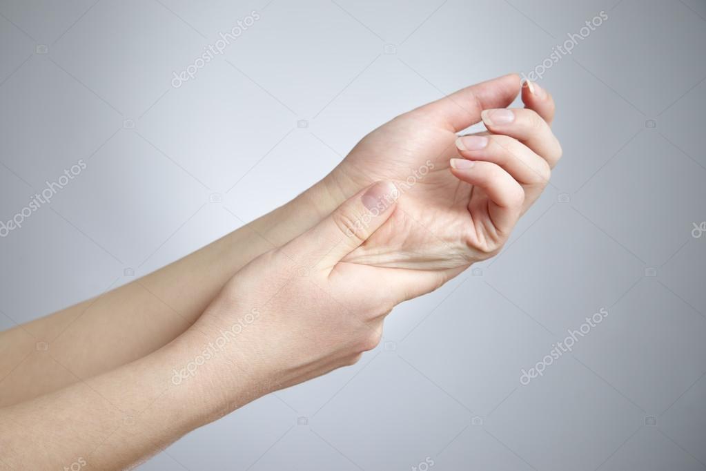 Pain in the joints of the hands Stock Photo by ©starast 44209397