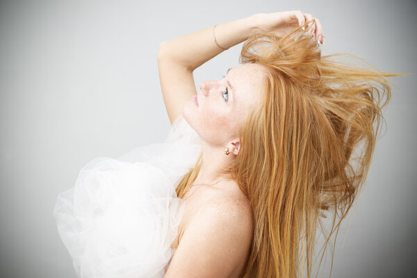 Портрет рыжеволосой женщины